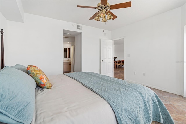 bedroom with connected bathroom and ceiling fan