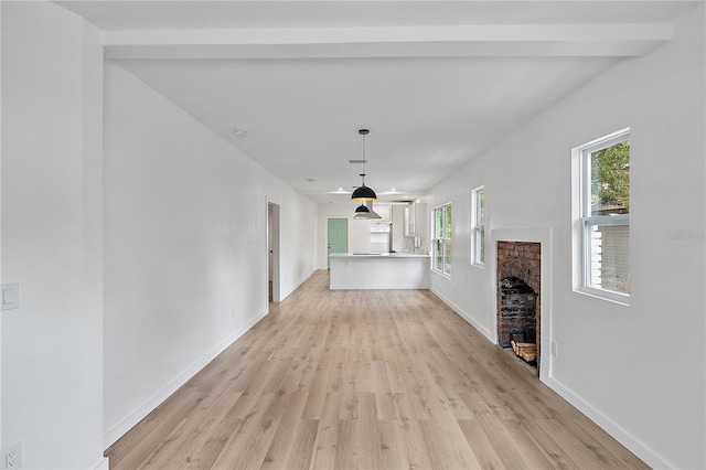 unfurnished living room with light hardwood / wood-style floors