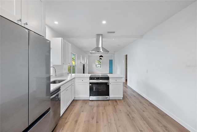 kitchen with appliances with stainless steel finishes, light wood-type flooring, extractor fan, sink, and white cabinets