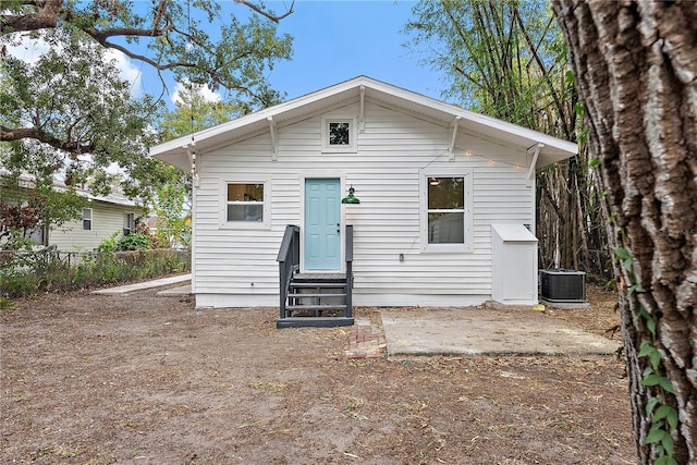 view of front of home featuring central air condition unit