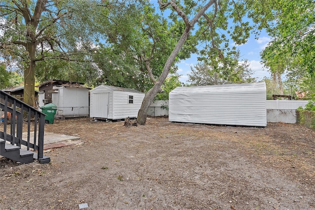 view of yard with a storage shed