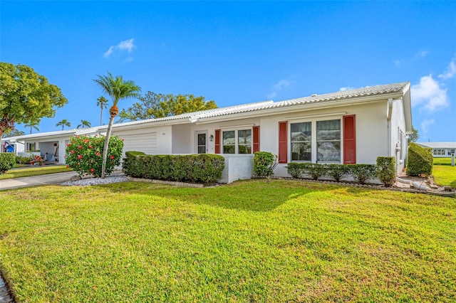 ranch-style house with a front yard