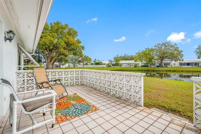 view of patio featuring a water view