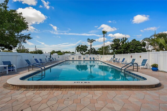 view of pool featuring a patio