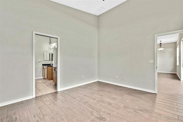 unfurnished room featuring light hardwood / wood-style flooring