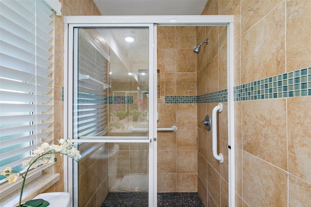 bathroom with a stall shower