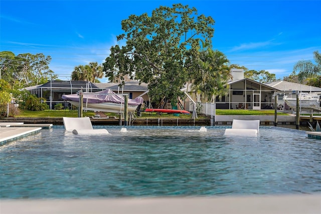 view of pool with a boat dock and boat lift