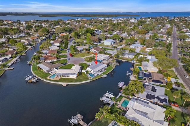 aerial view featuring a water view and a residential view