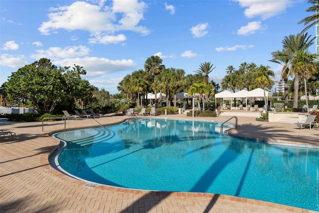 view of pool featuring a patio area