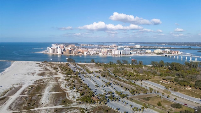 bird's eye view with a beach view and a water view