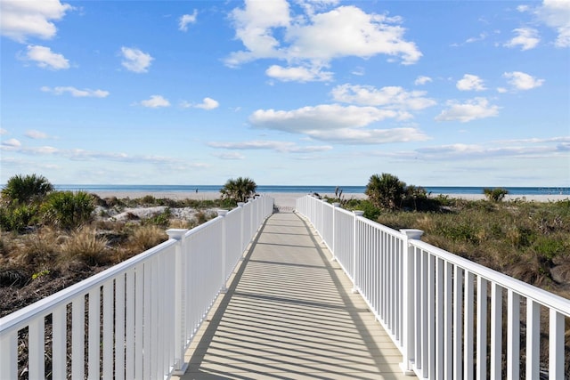 view of home's community with a view of the beach and a water view