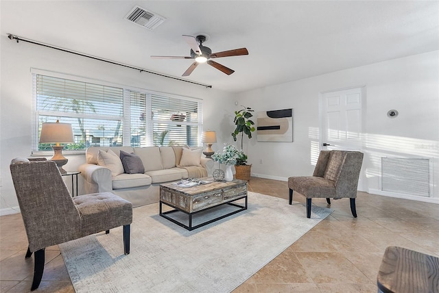 living room with ceiling fan