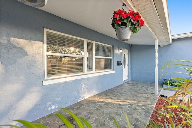 2461 61st Ln N, Saint Petersburg, FL 33710 - view of exterior entry with stucco siding