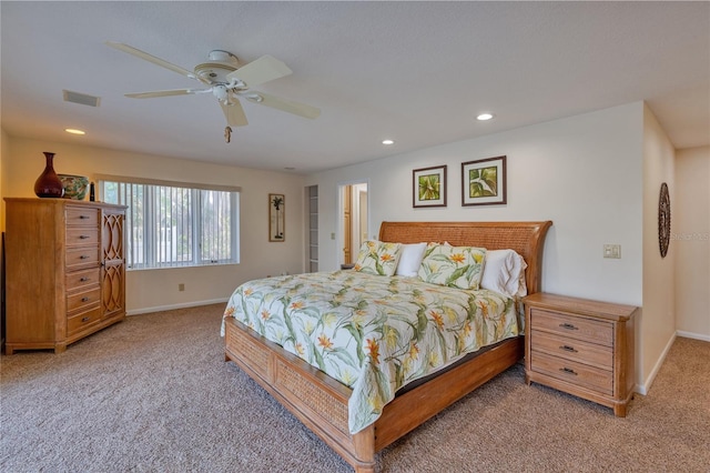 carpeted bedroom with ceiling fan