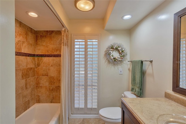 full bathroom with shower / tub combo, vanity, toilet, and tile patterned floors