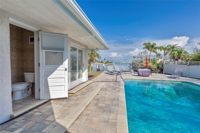 view of pool featuring a patio area