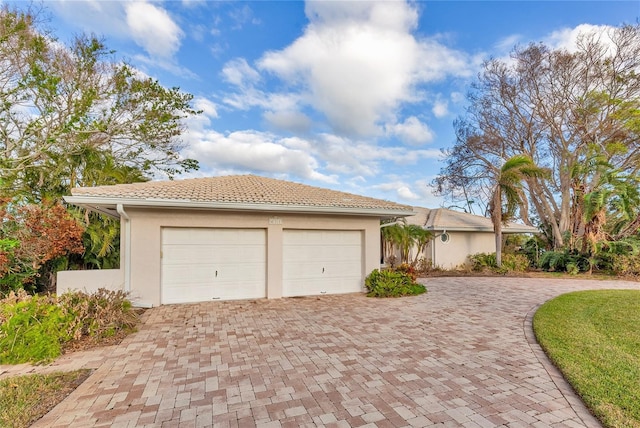 view of front of property featuring a garage