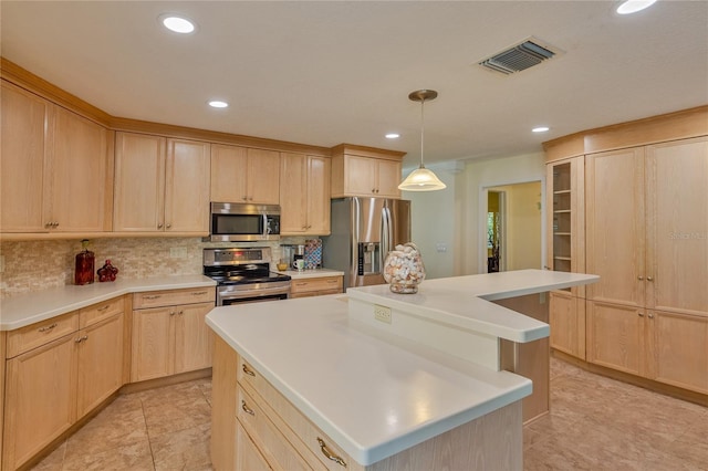 kitchen with decorative backsplash, a kitchen island, stainless steel appliances, and light brown cabinetry