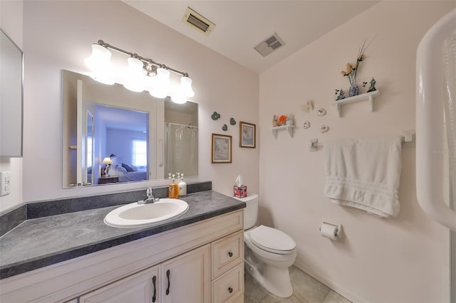 bathroom featuring tile patterned flooring, vanity, toilet, and a shower with shower curtain