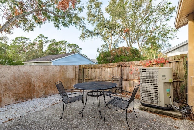 view of patio featuring ac unit