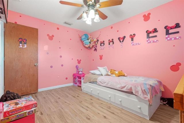 bedroom featuring ceiling fan and light wood-type flooring