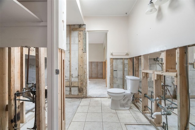 bathroom with tile patterned floors and toilet