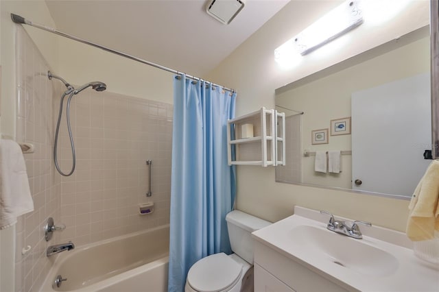 full bathroom featuring vanity, shower / bathtub combination with curtain, and toilet