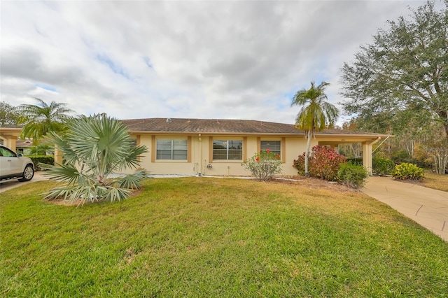 single story home with a front lawn