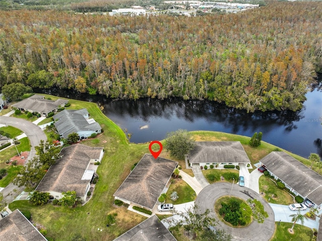 birds eye view of property featuring a water view