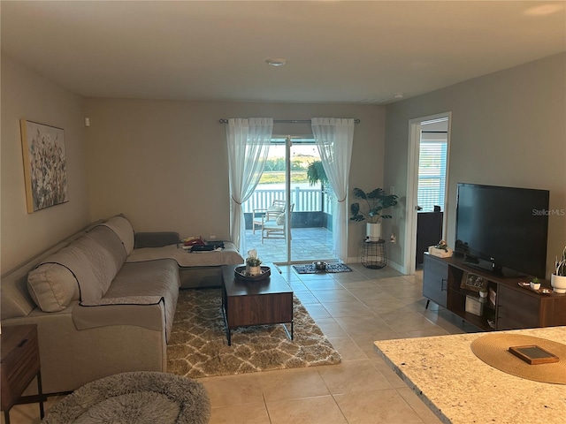 living room with light tile patterned floors