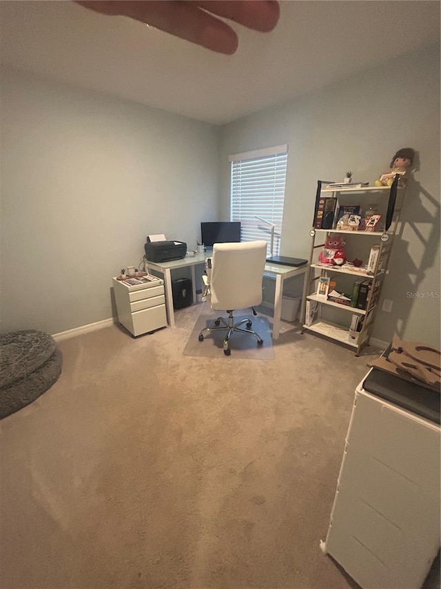 office space with carpet flooring and ceiling fan