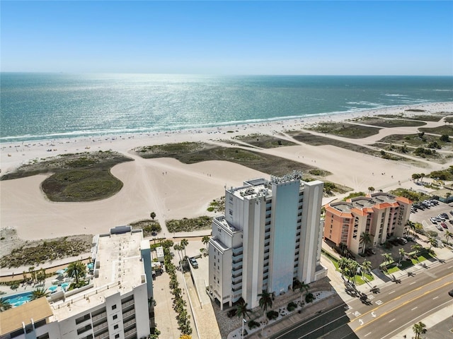 bird's eye view with a view of the beach and a water view