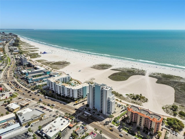 bird's eye view with a beach view and a water view