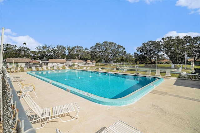 view of pool featuring a patio area