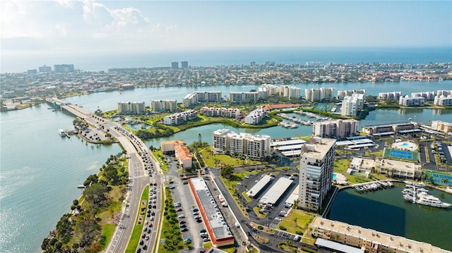 drone / aerial view featuring a water view and a view of city