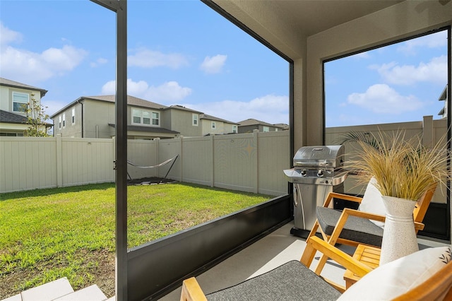 sunroom with a residential view