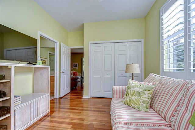 living room with light hardwood / wood-style flooring