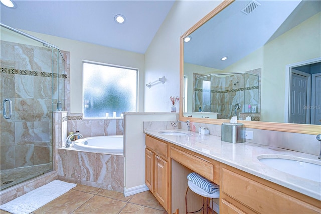 bathroom with tile patterned flooring, vanity, lofted ceiling, and plus walk in shower