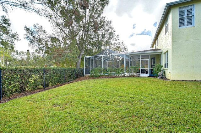 view of yard featuring a lanai