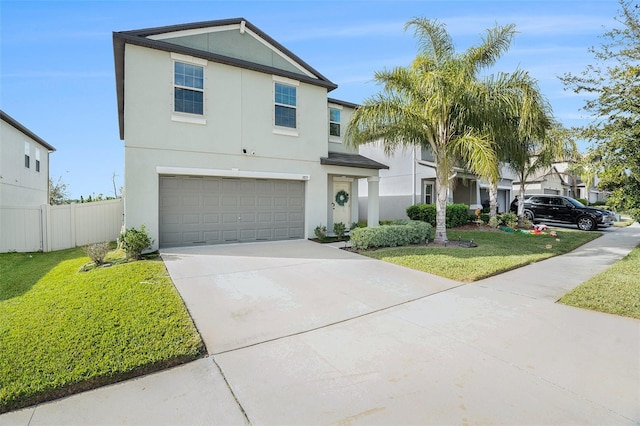 view of front of home with a garage and a front yard