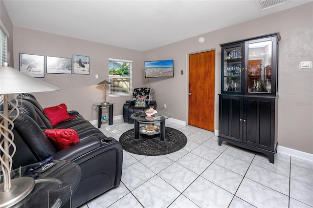 living room featuring light tile patterned floors