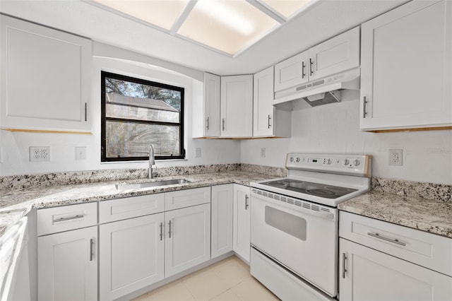 kitchen featuring light stone countertops, white appliances, white cabinetry, and sink