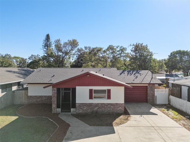 single story home featuring a garage