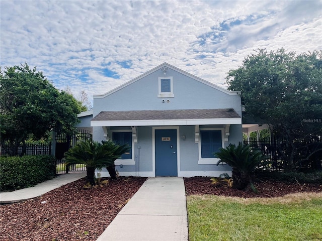 bungalow-style house featuring covered porch