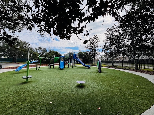 view of jungle gym featuring a yard