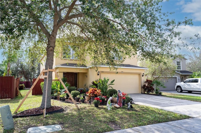 view of front of house featuring a garage and a front yard