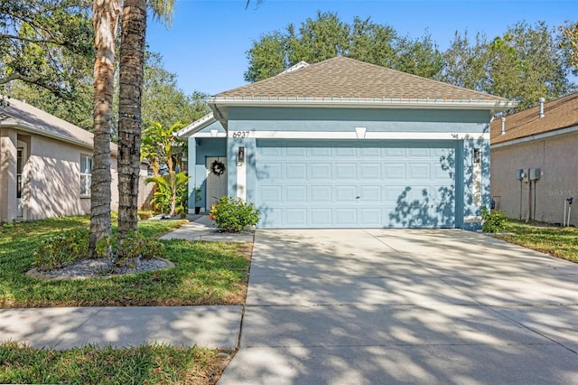 view of front of property with a garage