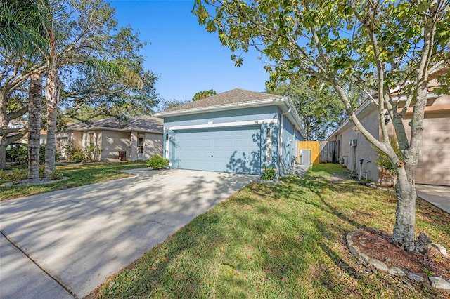 ranch-style house with a front yard and a garage