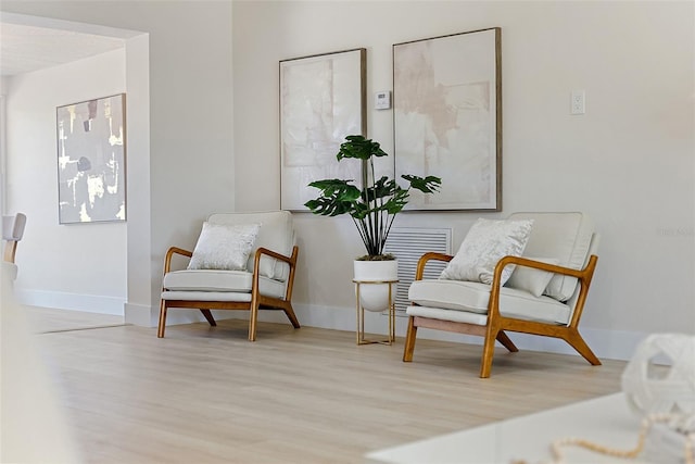 living area with light wood-type flooring