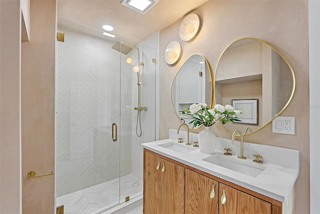 bathroom with vanity and an enclosed shower